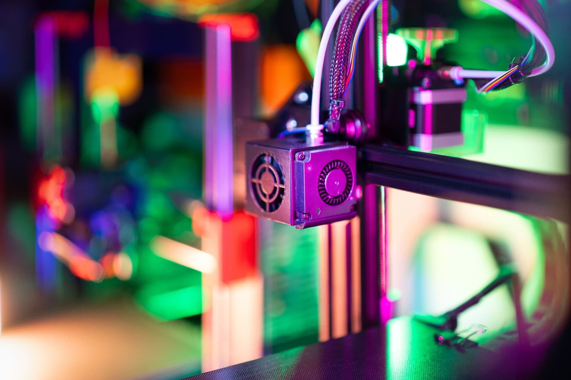 A disassembled 3D printer hotend during maintenance