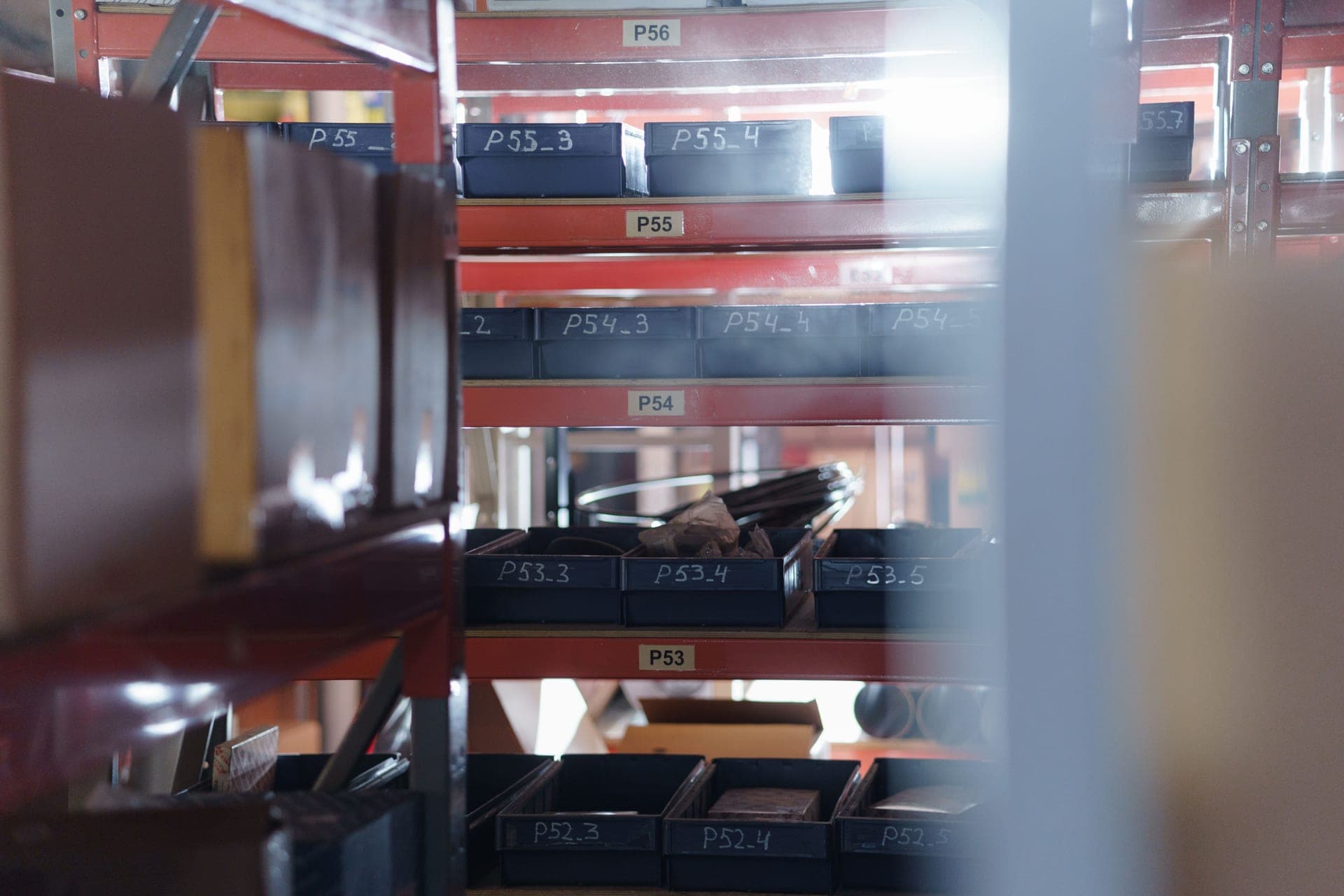 Storage containers with desiccant packets on a shelf